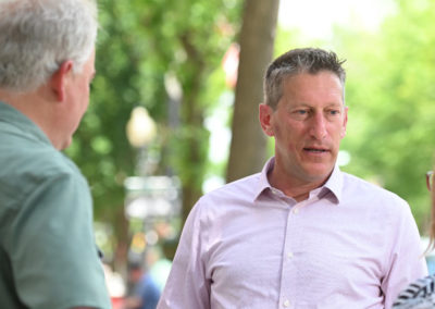 Andrew Zwicker talking with locals.